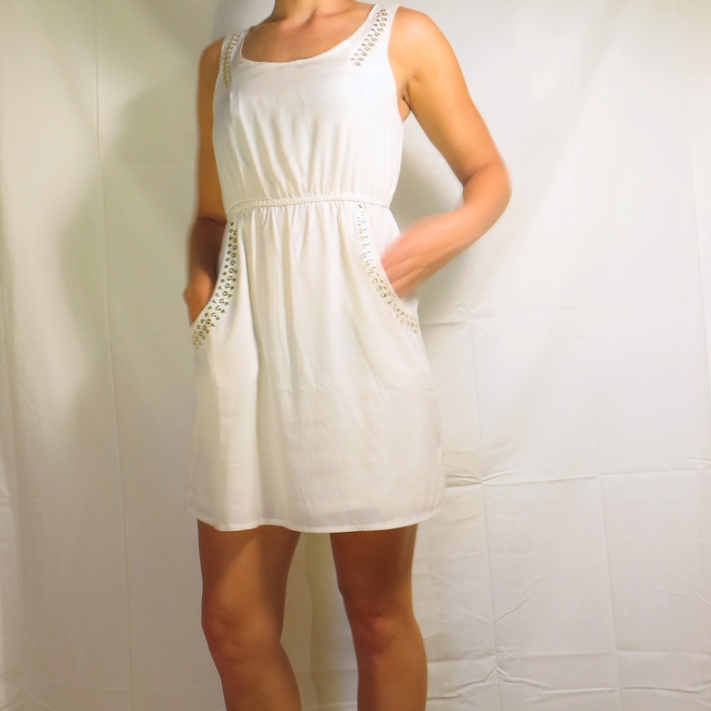 Off-White Dress with Gold Accents and Pockets